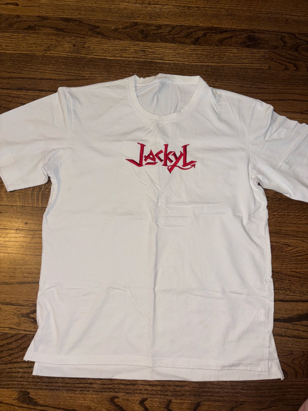 White Graphic Tee with Red Script Logo